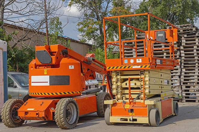 forklift carrying heavy pallets in warehouse in San Marcos